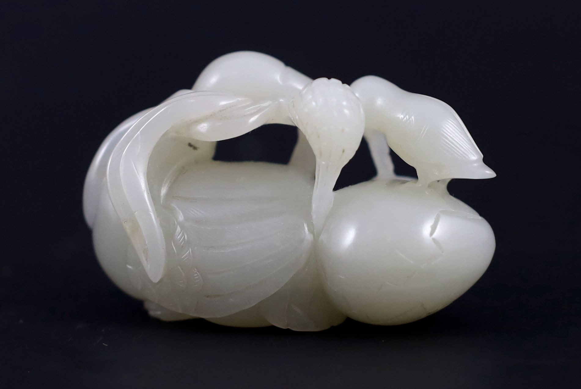 A Chinese pale celadon jade duck group, 5.5 cm long